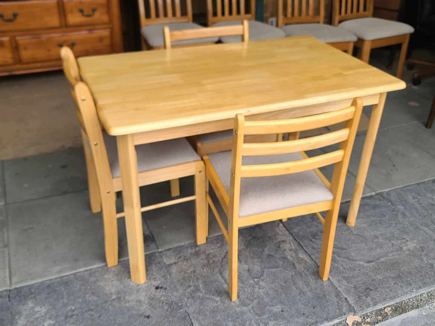 Light wood dining set with 4 chairs