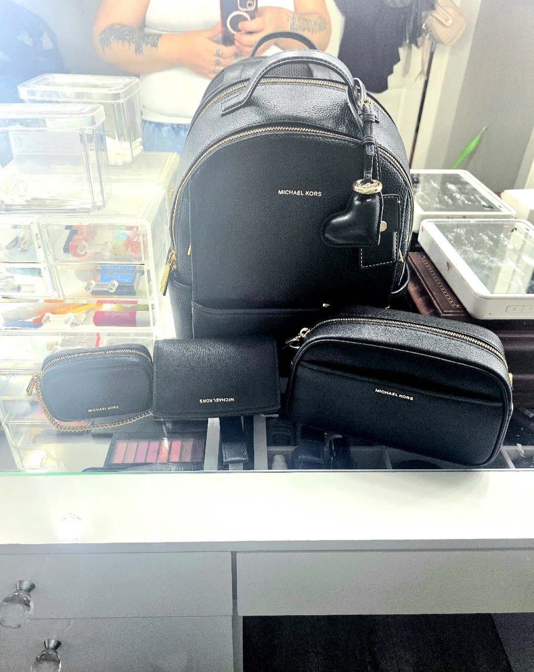 Michael kors backpack, and matching pieces.