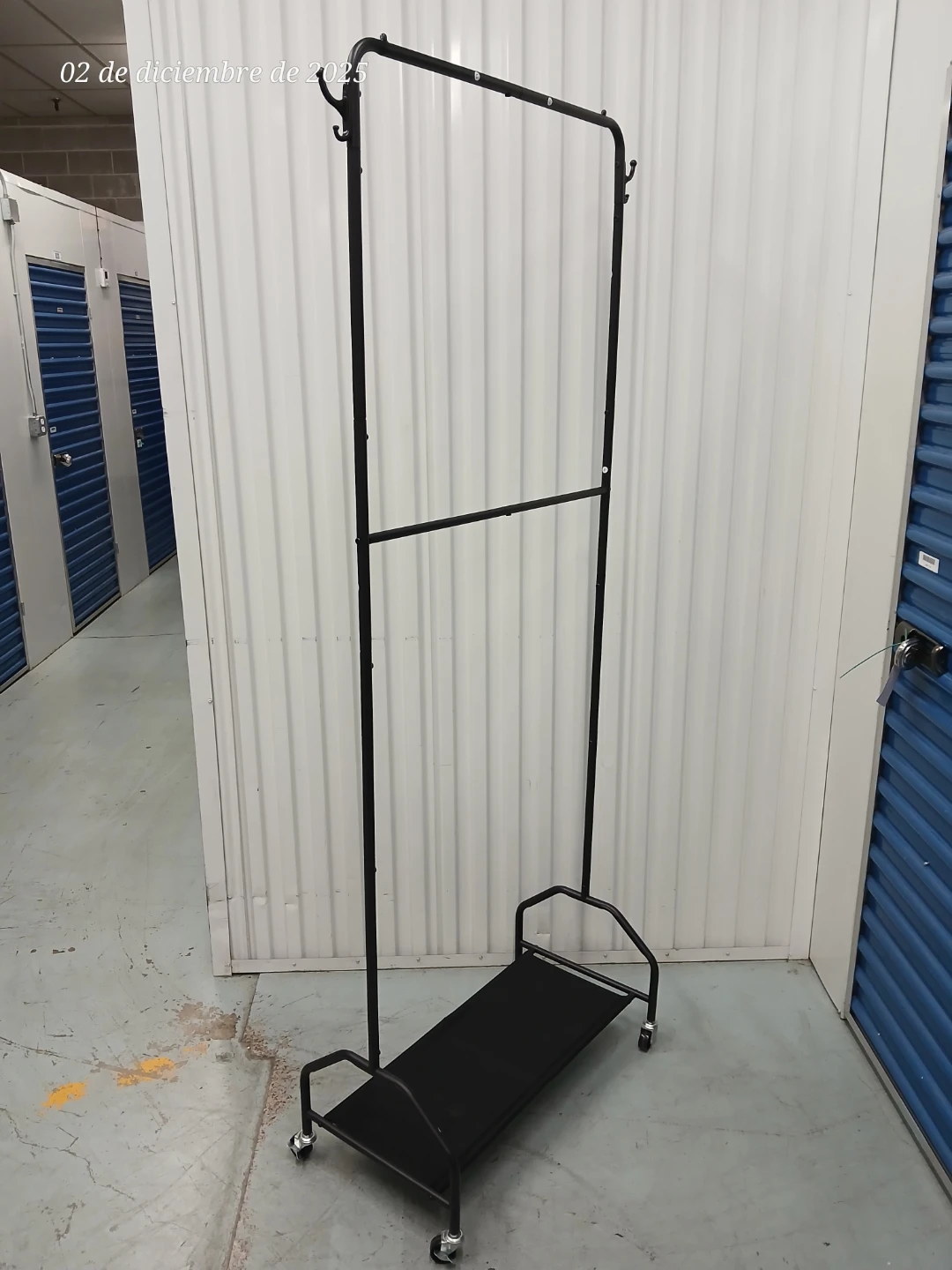 Rolling clothes rack Double Garment Rack bottom shelf - photo 5