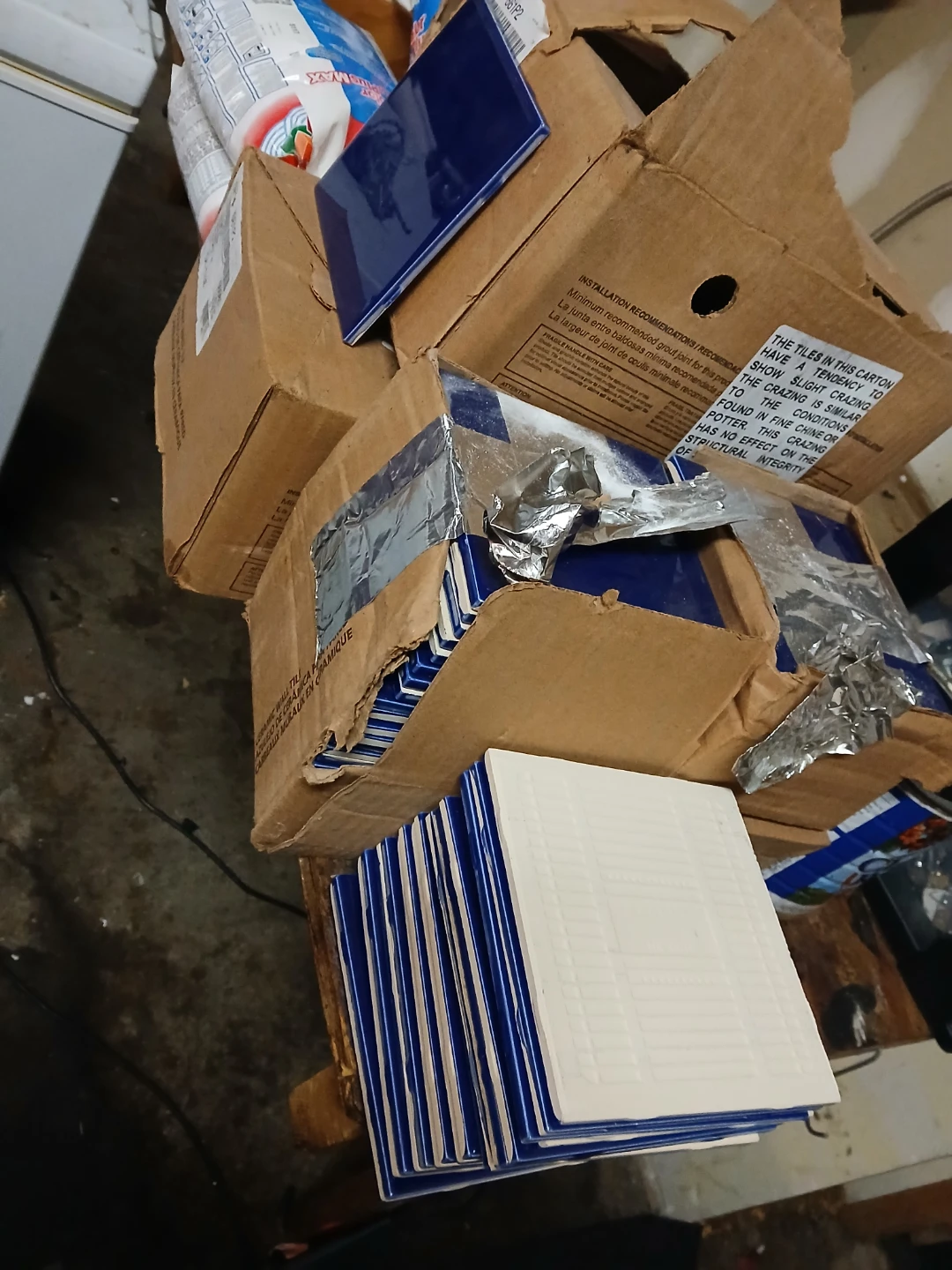 3 boxes of tile and grouth - photo 5