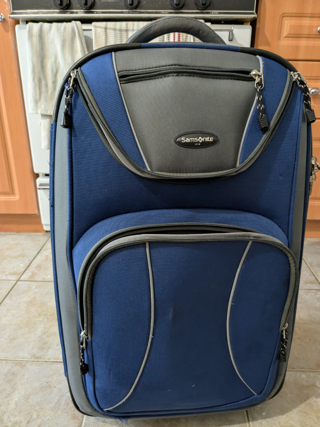 Samsonite Blue & Grey Rolling Suitcase