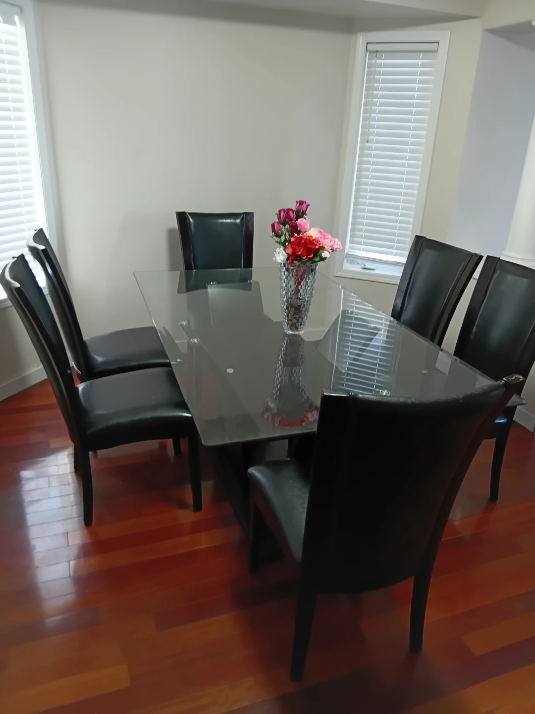 Glass Dining Table with 6 Black Chairs