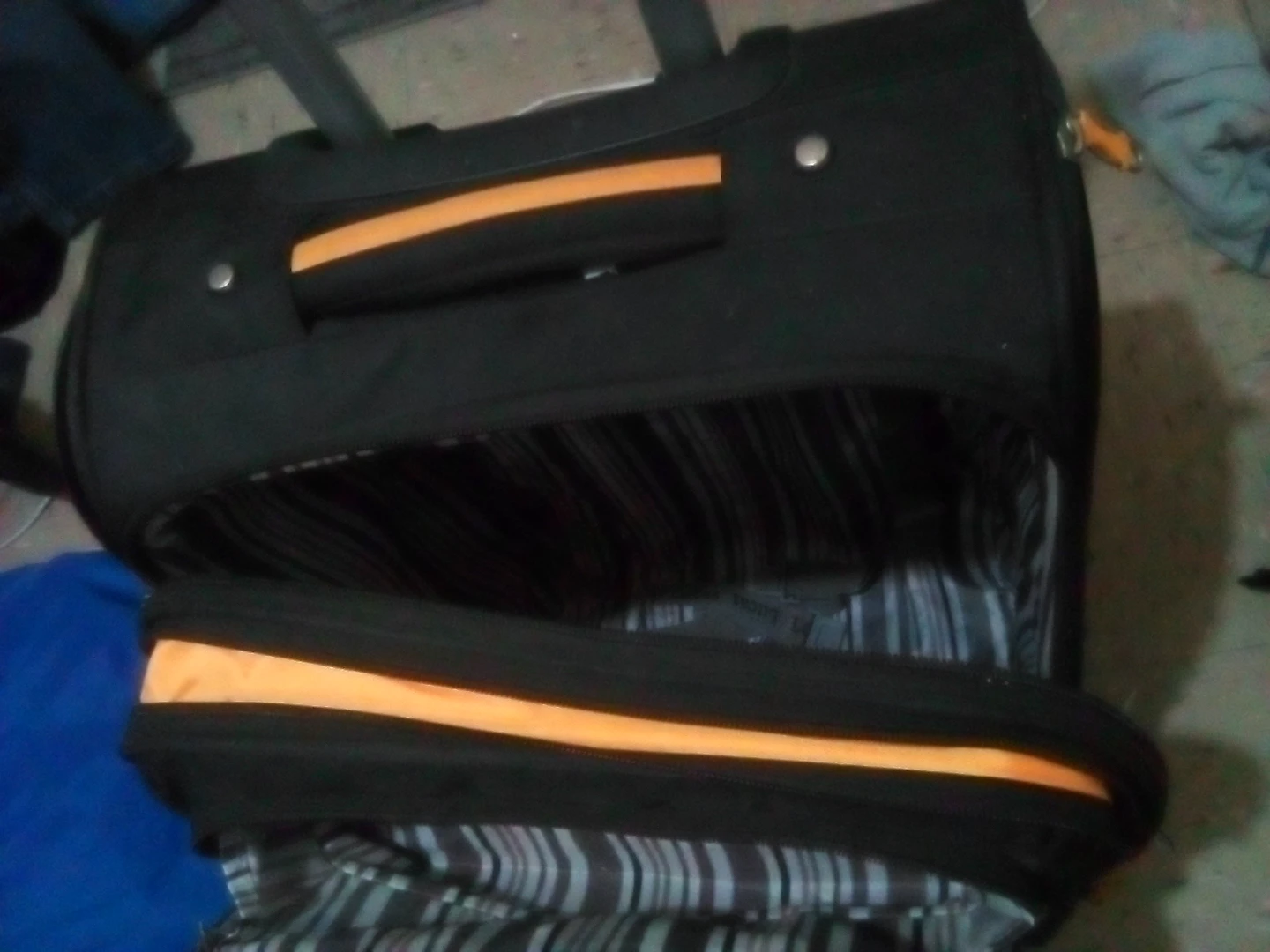 Black Rolling Suitcase with Orange Accents - photo 5