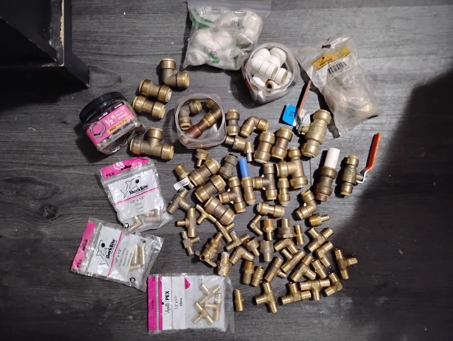 Assorted Plumbing Fittings and PEX Tubing
