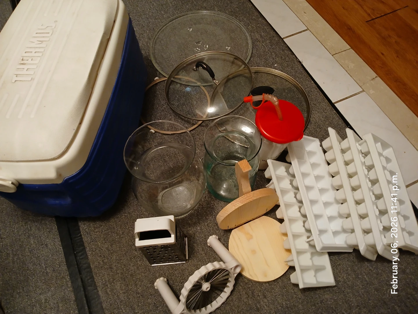 Ice cooler box, glass vase, pot lids, microwave glass plate.