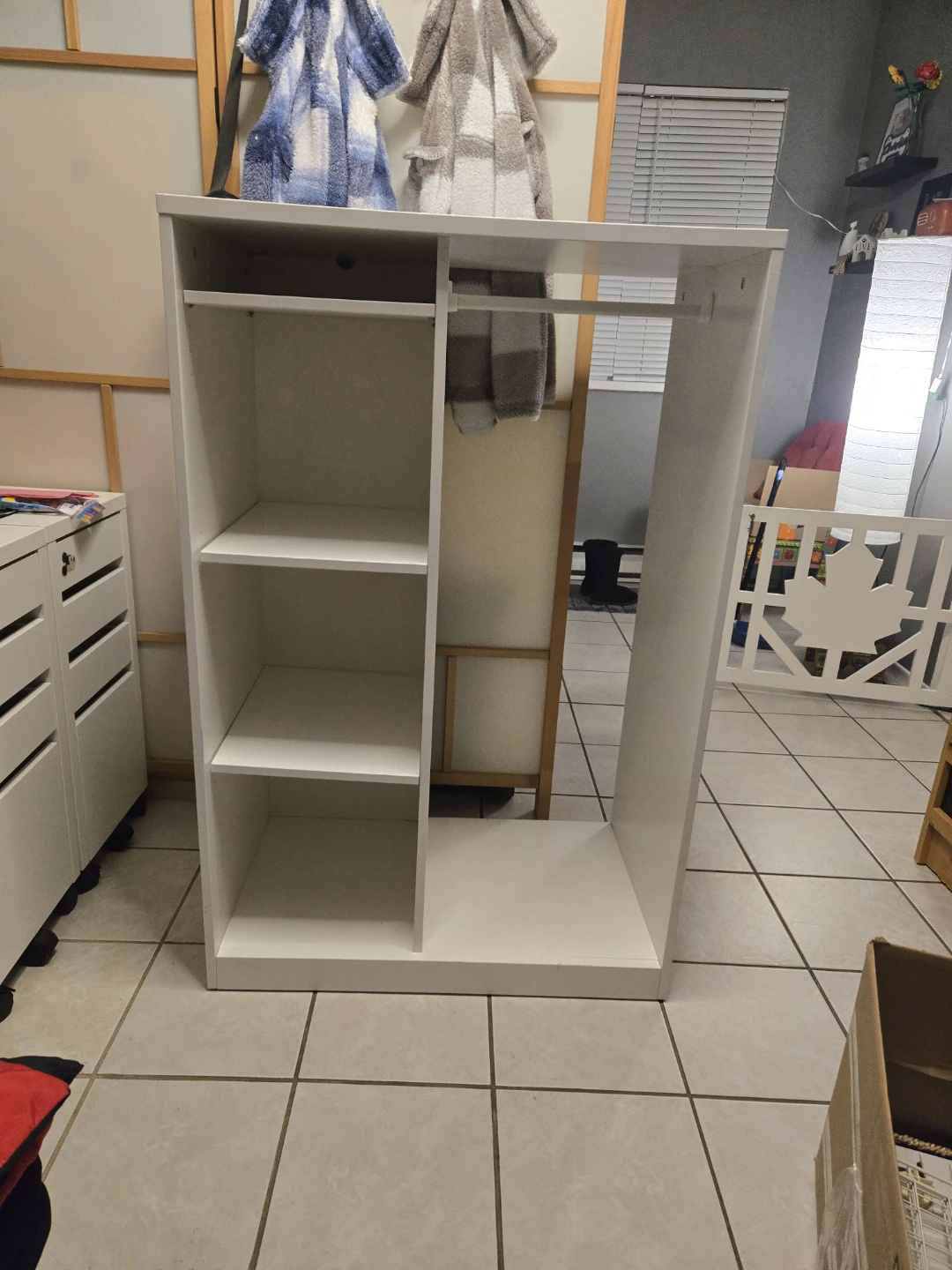 White Closet Organizer with Shelves and Hanging Rod