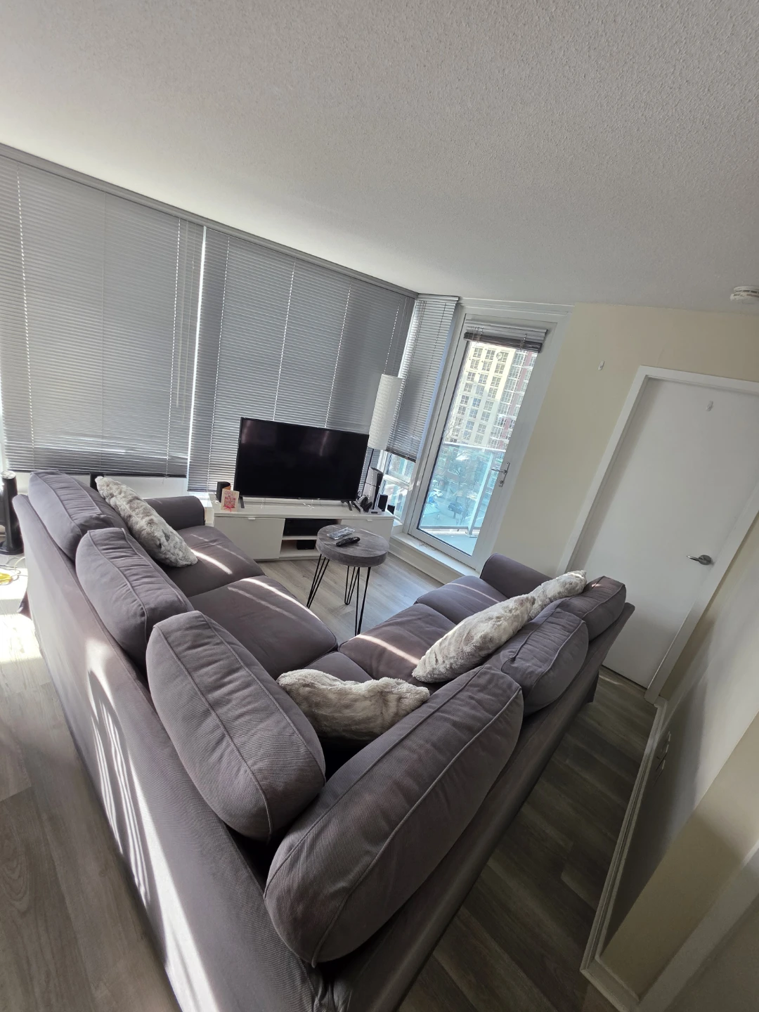 IKEA 4 Seater Corner - Free Round Table & Fur Cusions