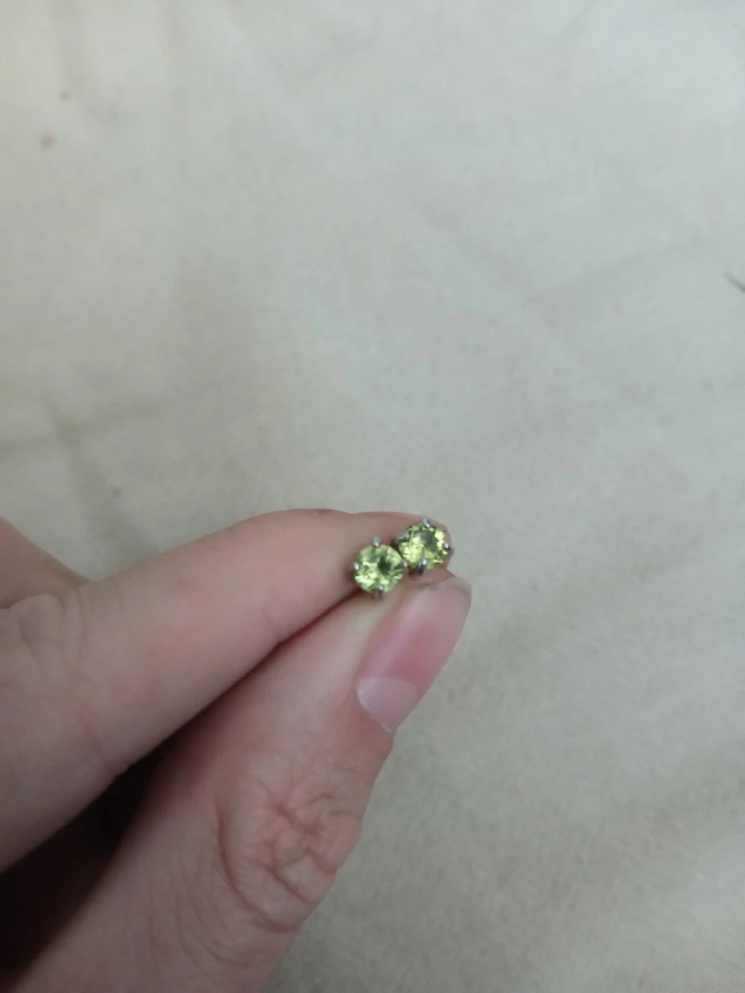 925 Silver And 4 Prong Peridot Stud Earrings