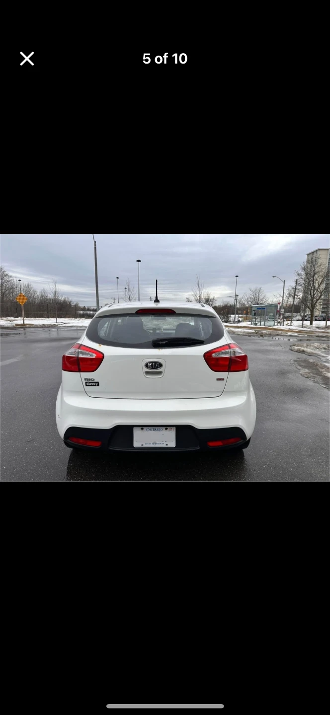 White Kia Rio 5-Door Hatchback