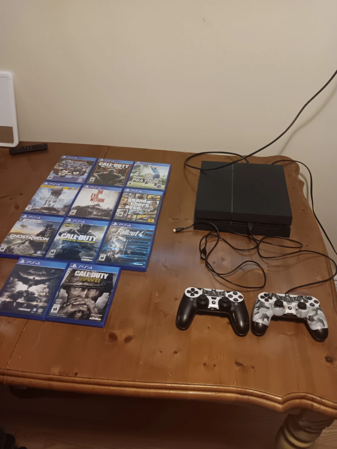 PlayStation 4 Console with 9 Games and 2 Controllers - photo 2