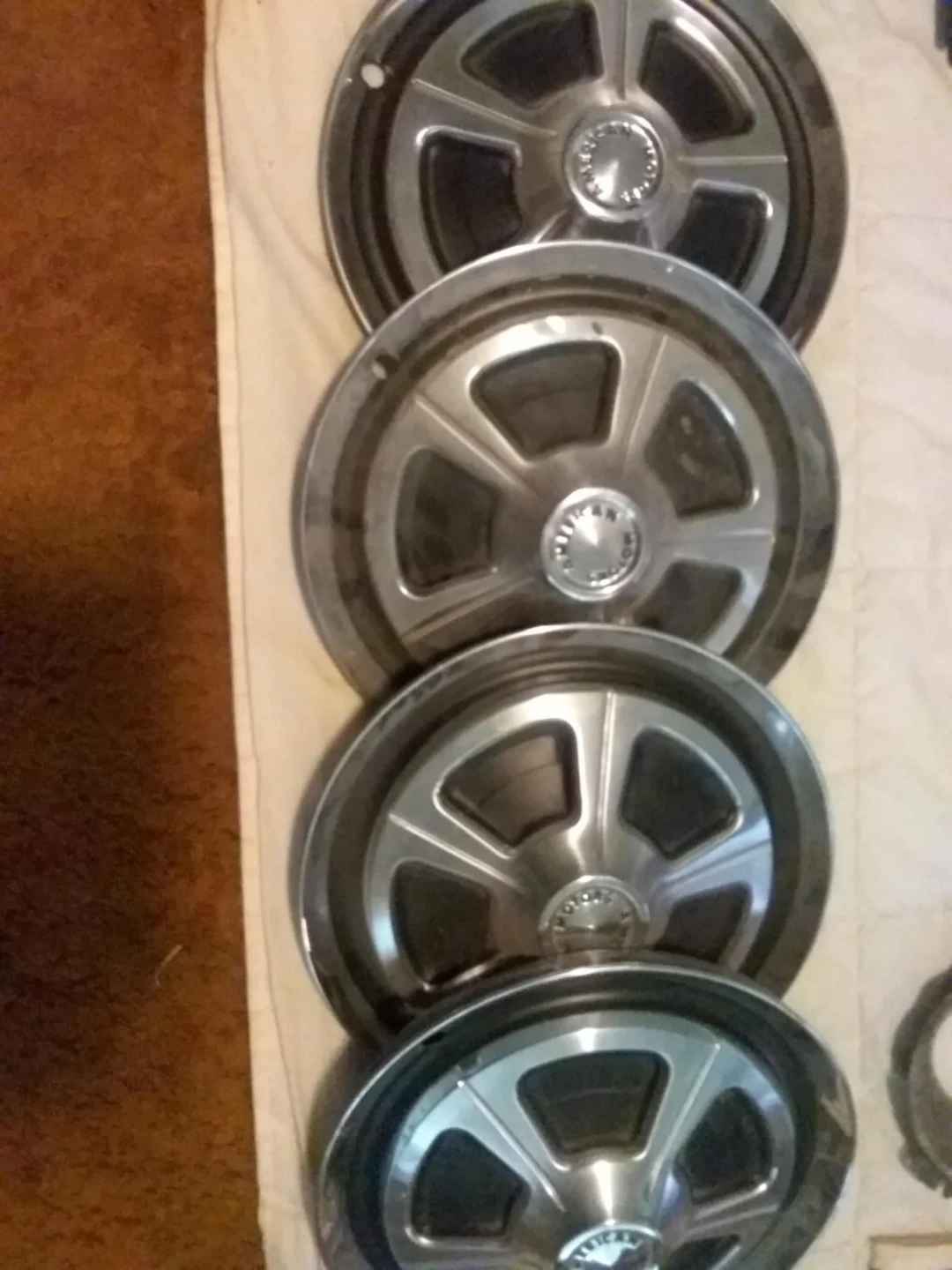 Amc vintage hubcaps set 4