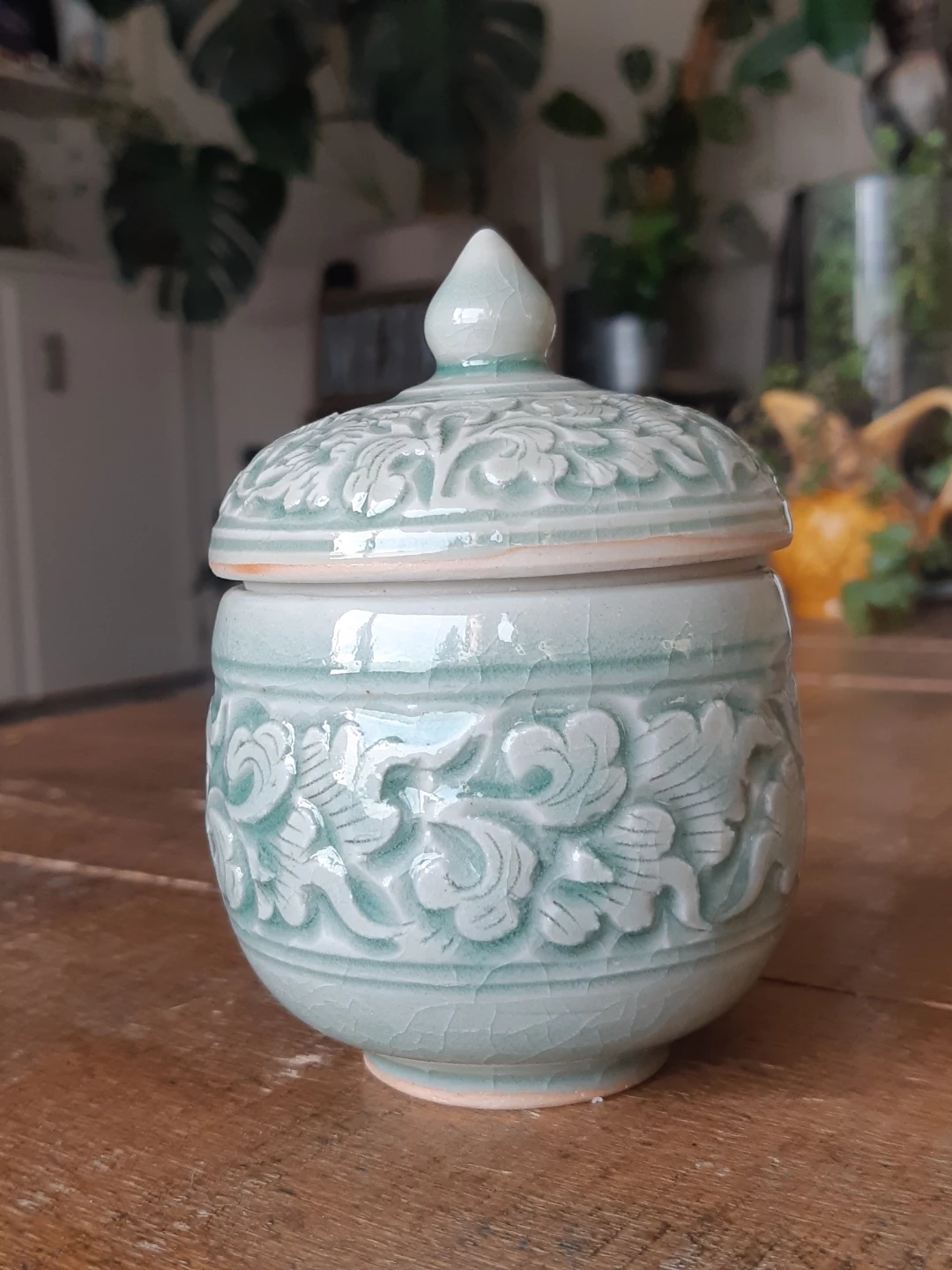 Handcrafted celadon ceramic decorative jar