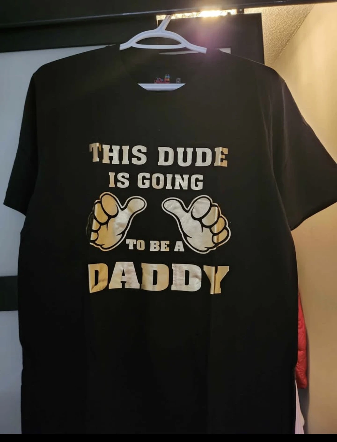 Matching "Mommy to Be" and "Daddy to Be" T-shirts