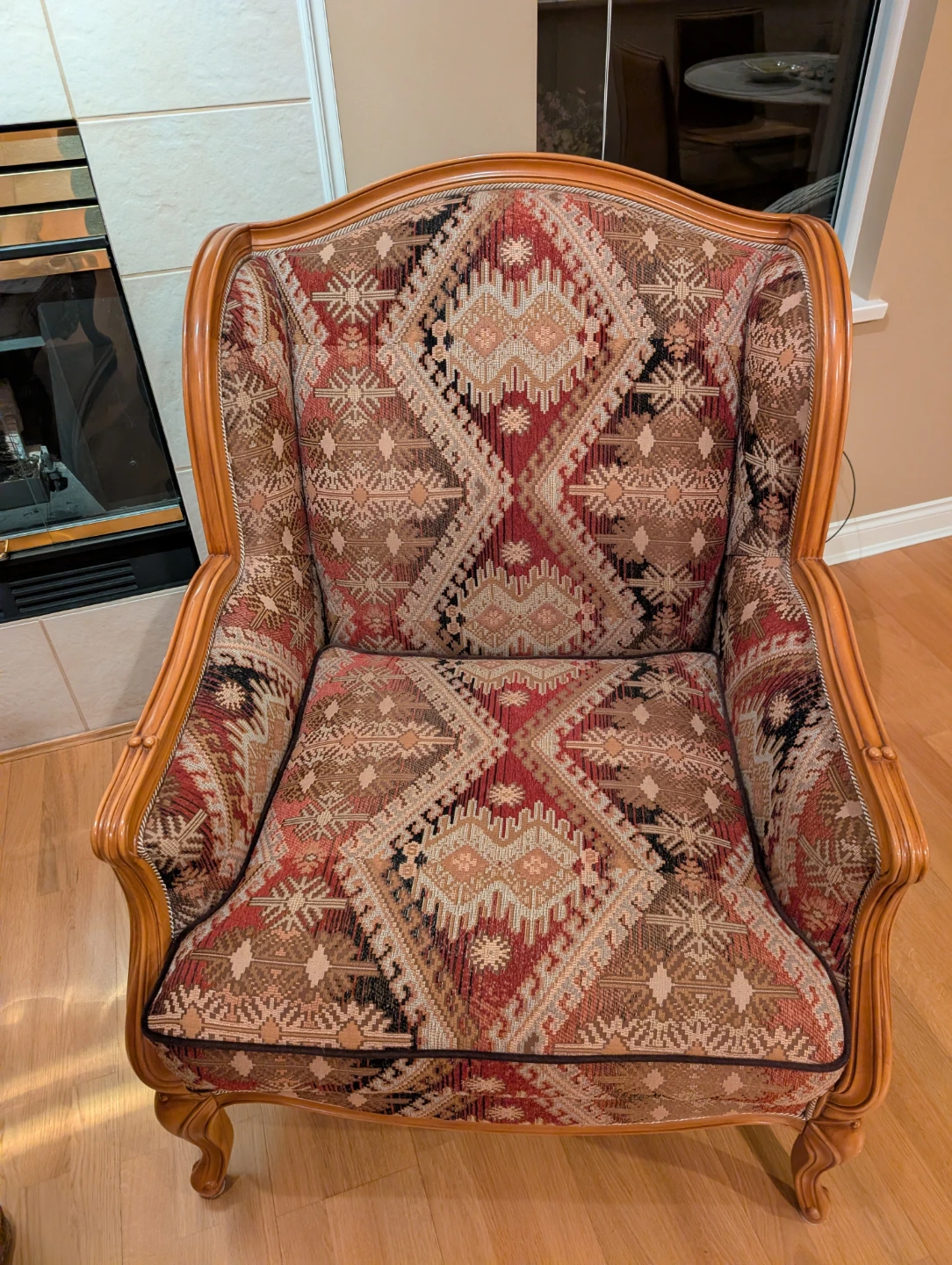 Armchair with ornate fabric and wooden frame - photo 4