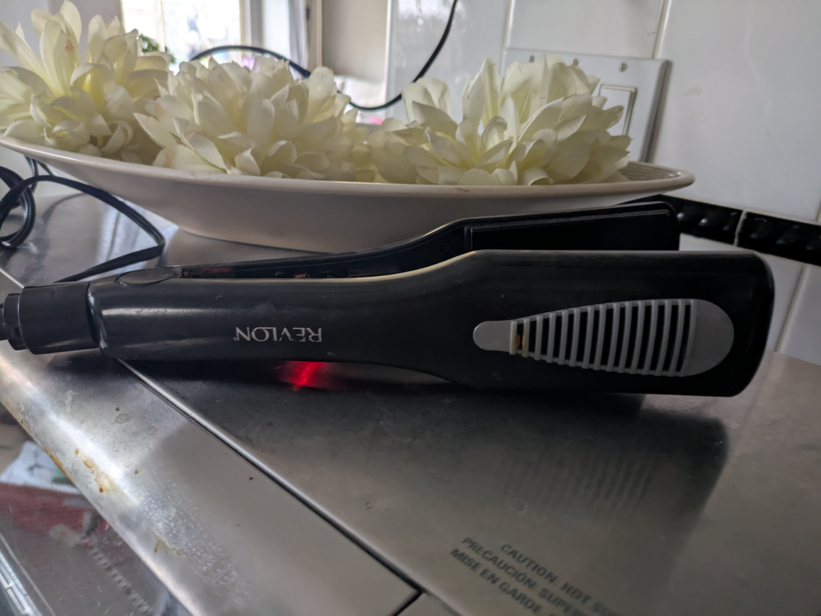 REVLON straightening iron 2 inch wide plate
