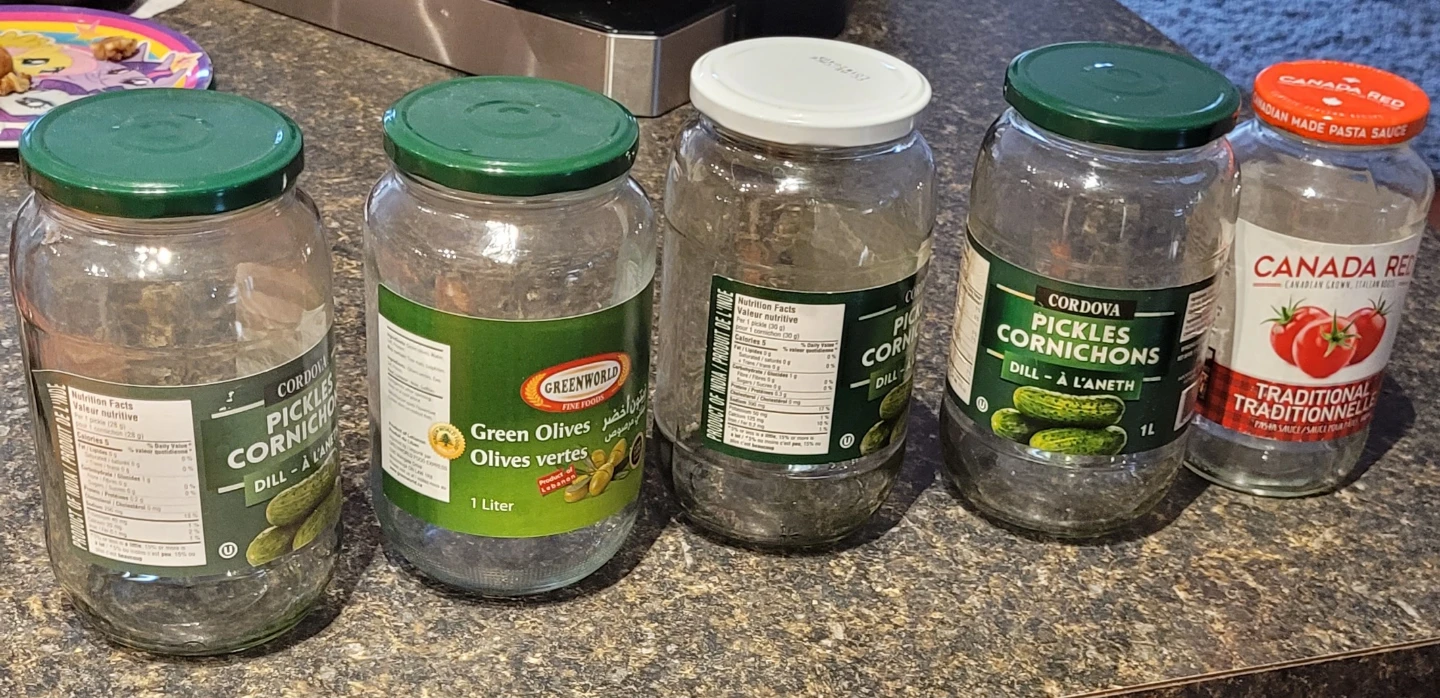 Empty Glass Jars: Cordova Pickles, Green Olives, Canada Red