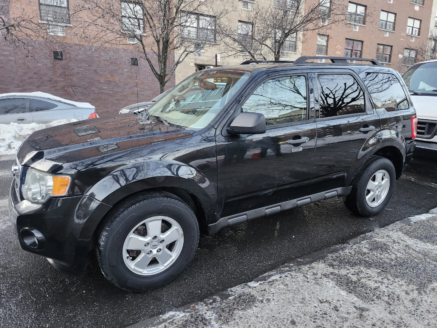 Black Ford Escape SUV - photo 3