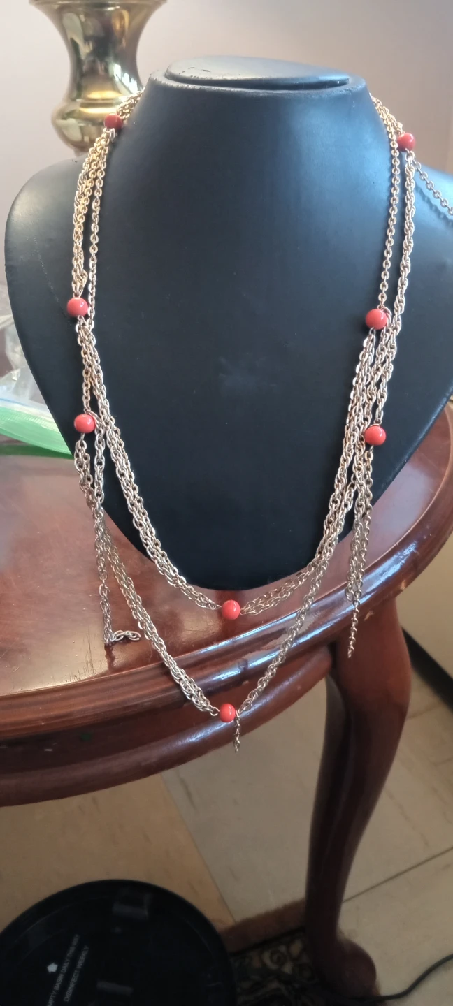 Gold-tone layered necklace with orange beads