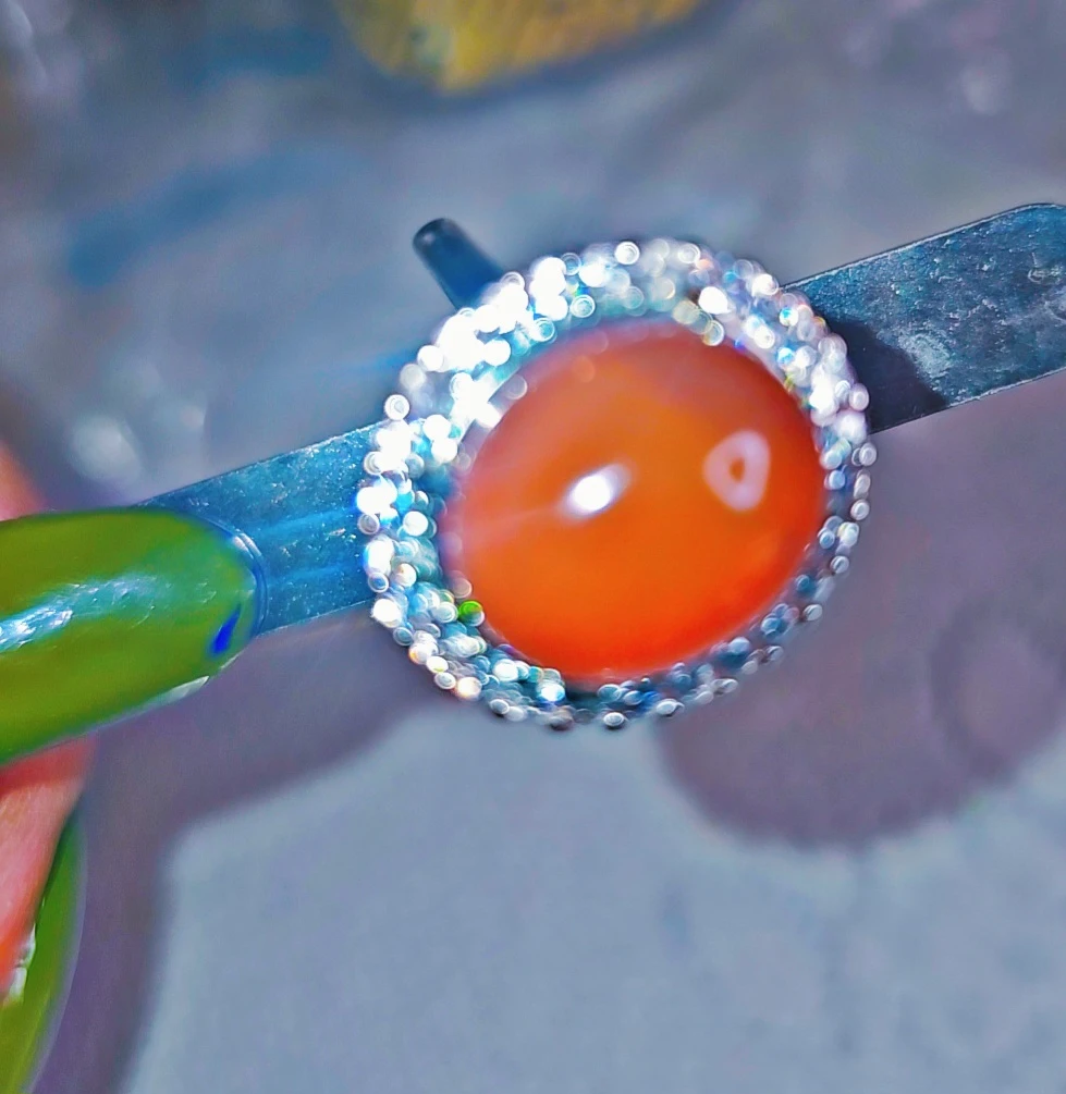 Carnelian big centre gemstone with diamond accents ring