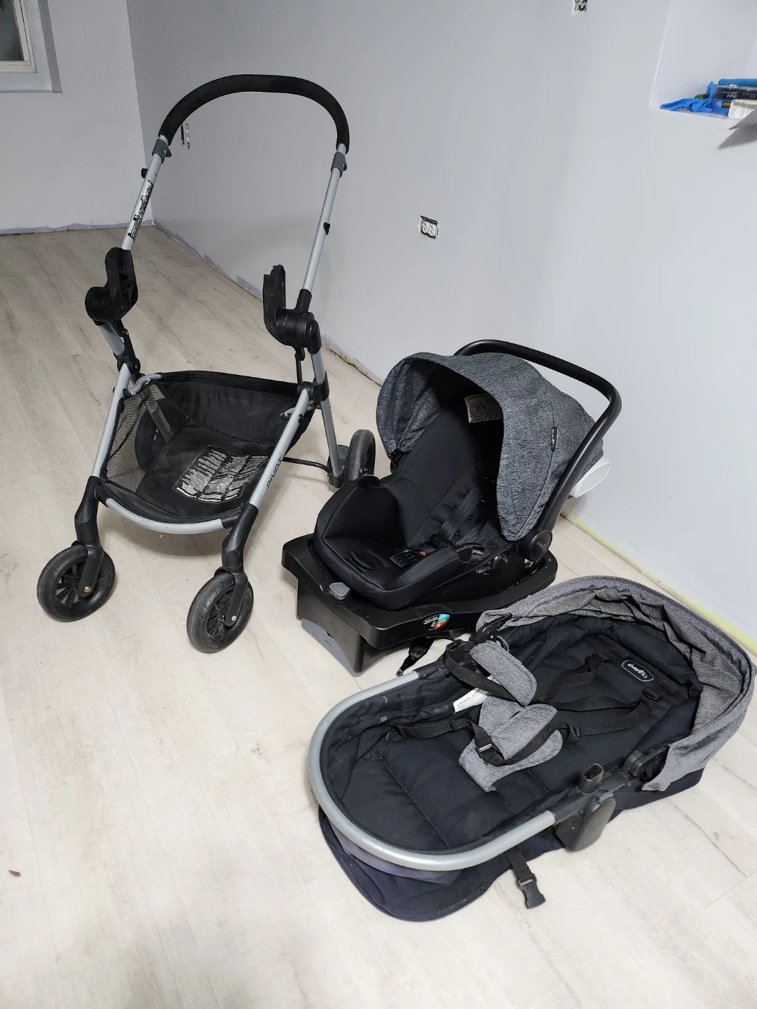 Evenflo Pivot Travel System with Car Seat & Stroller
