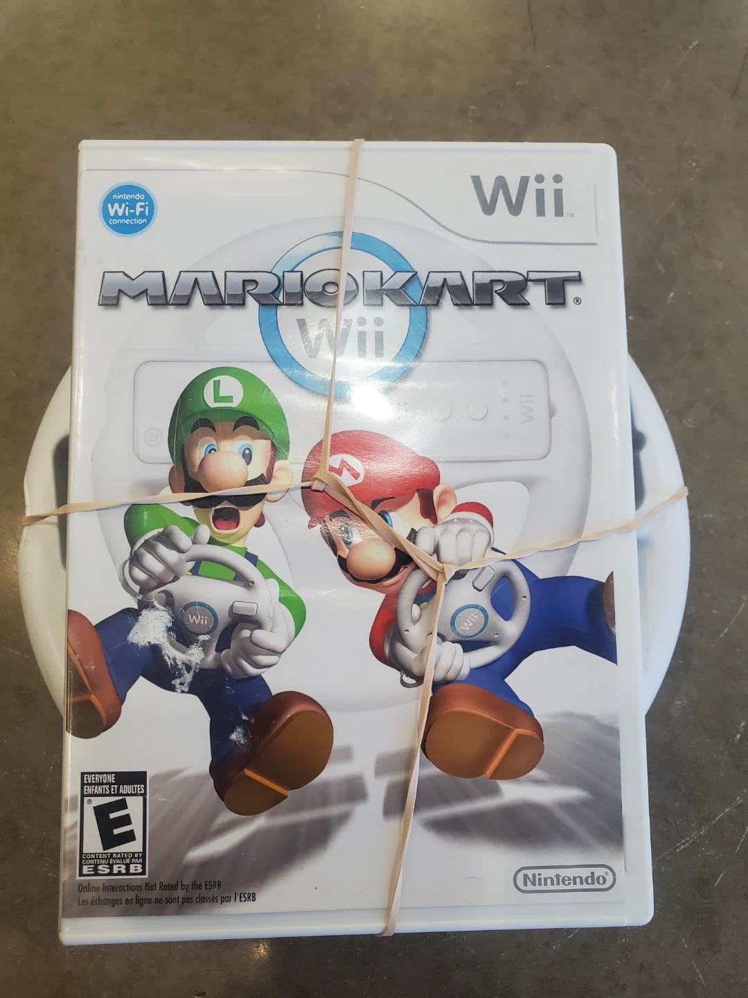 Nintendo Wii Mario Kart Steering Wheel and Game Bundle