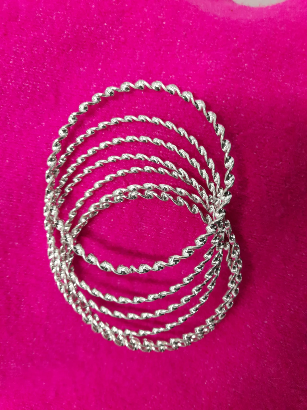 Set of 8 Faux Silver Twisted Bangles