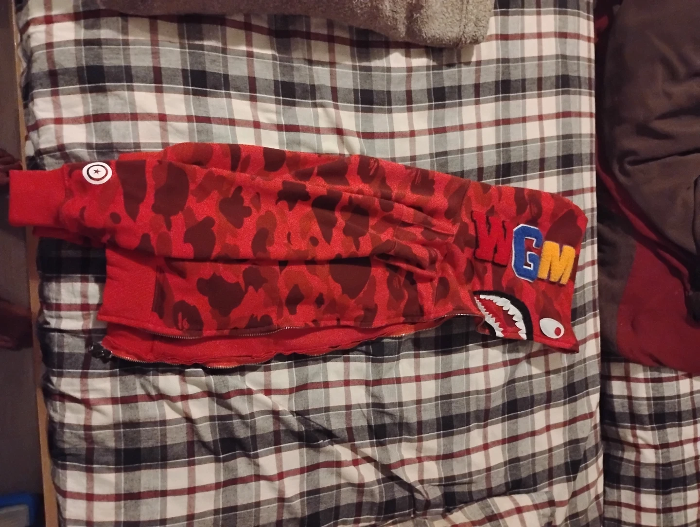 A BAPE red shark head hoodie