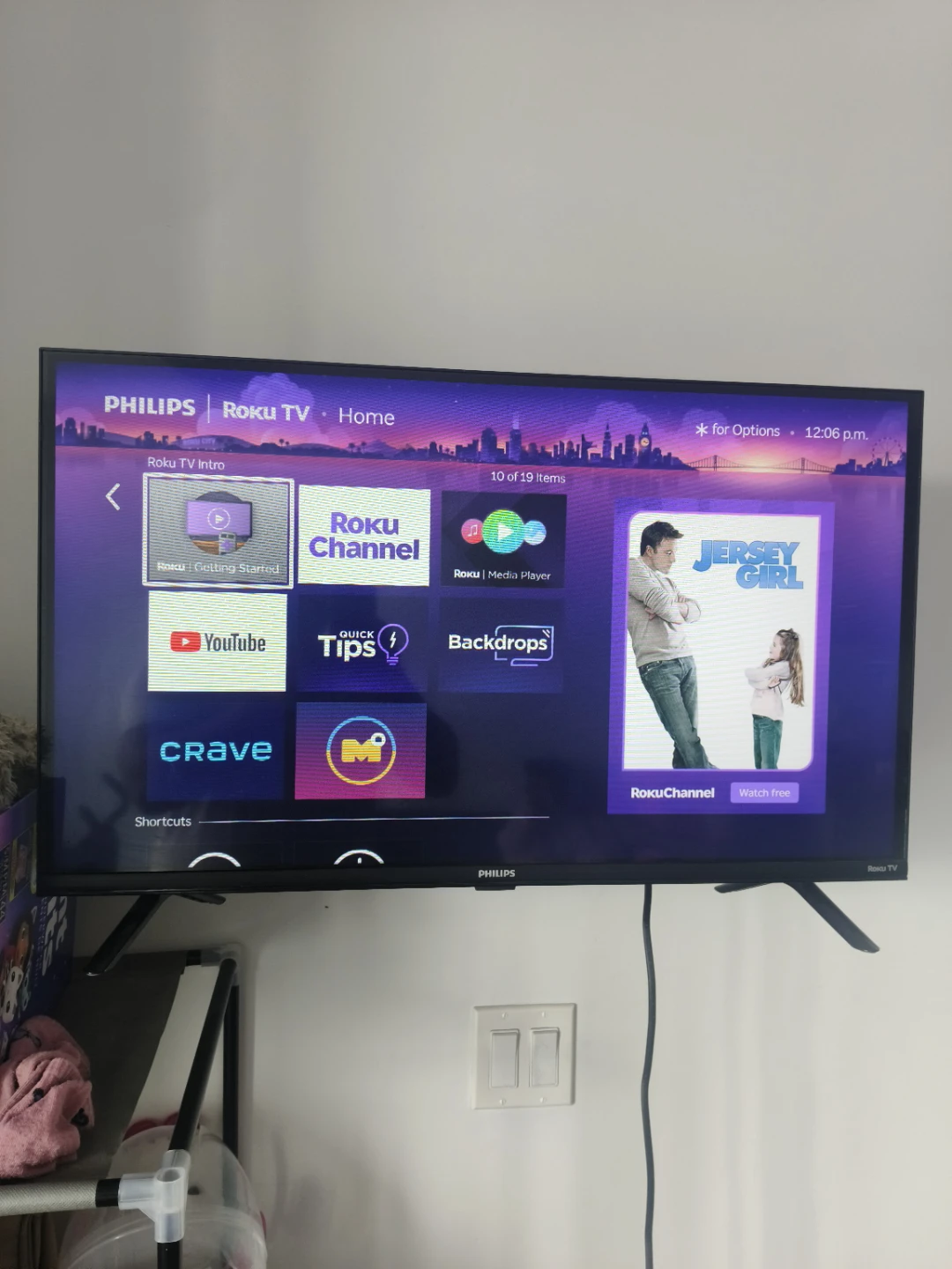 Philips Roku TV with wall mount stand