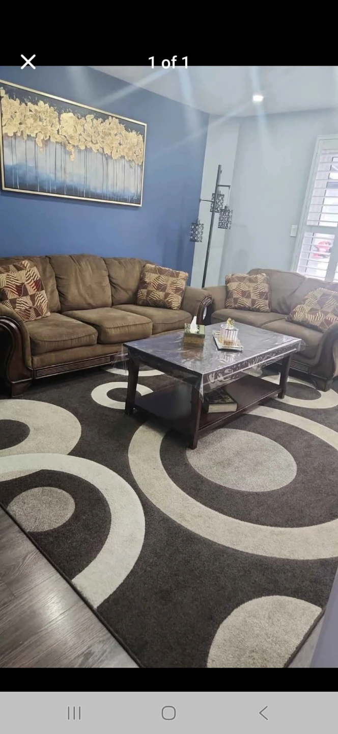 Verkonia Area Rug - Dark Brown