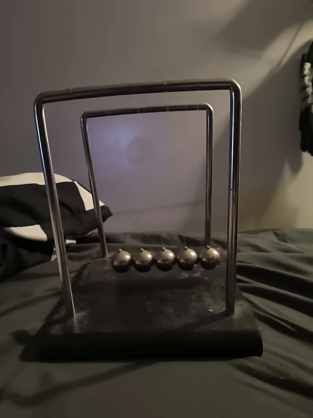 Newton's Cradle Balancing Balls