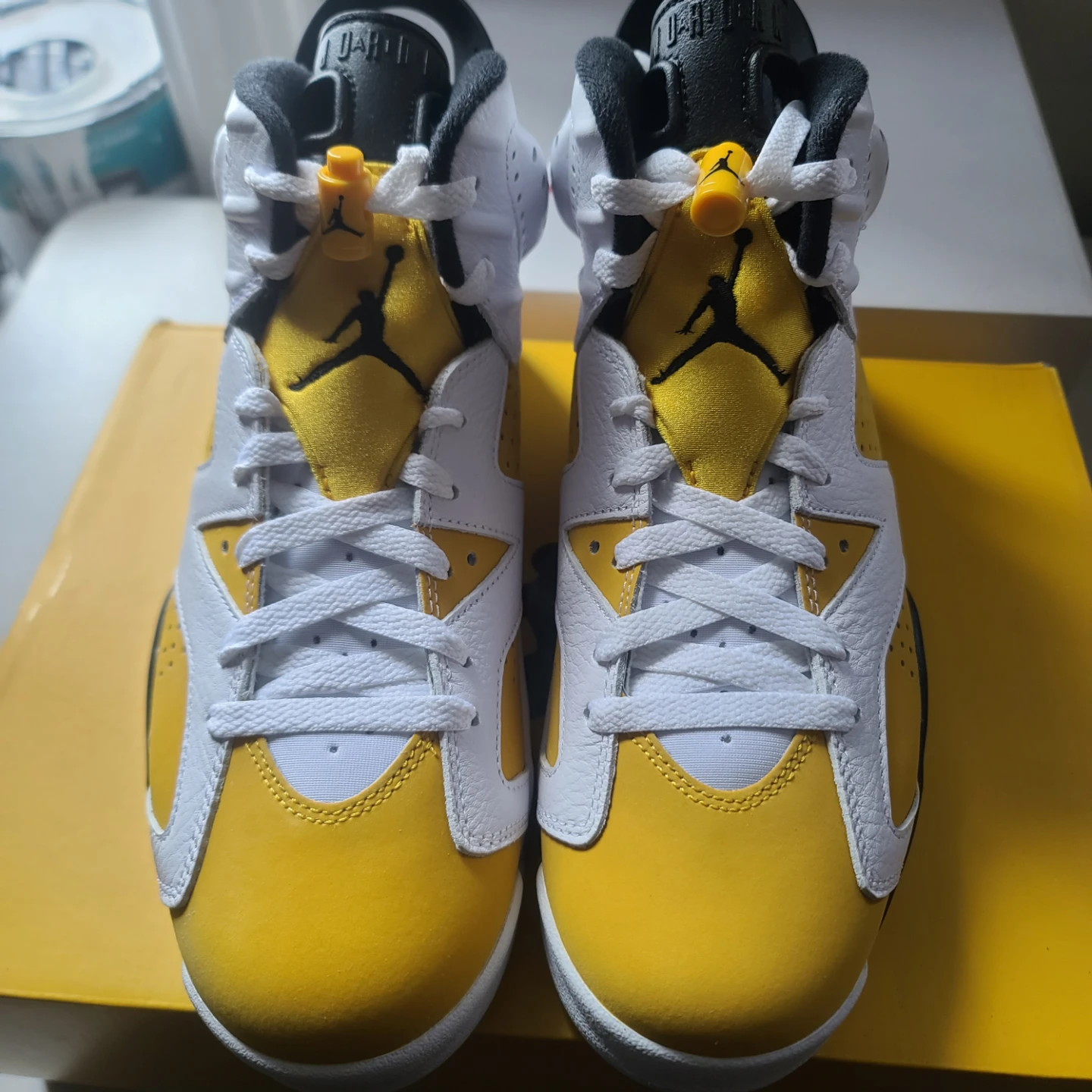Air Jordan 6 Retro "University Gold" Sneakers