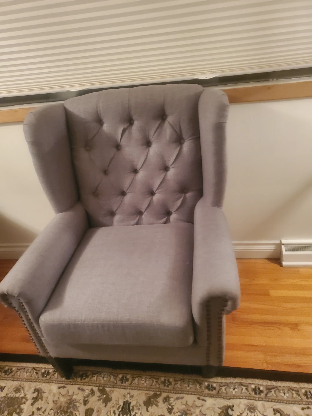 Grey wing back chair