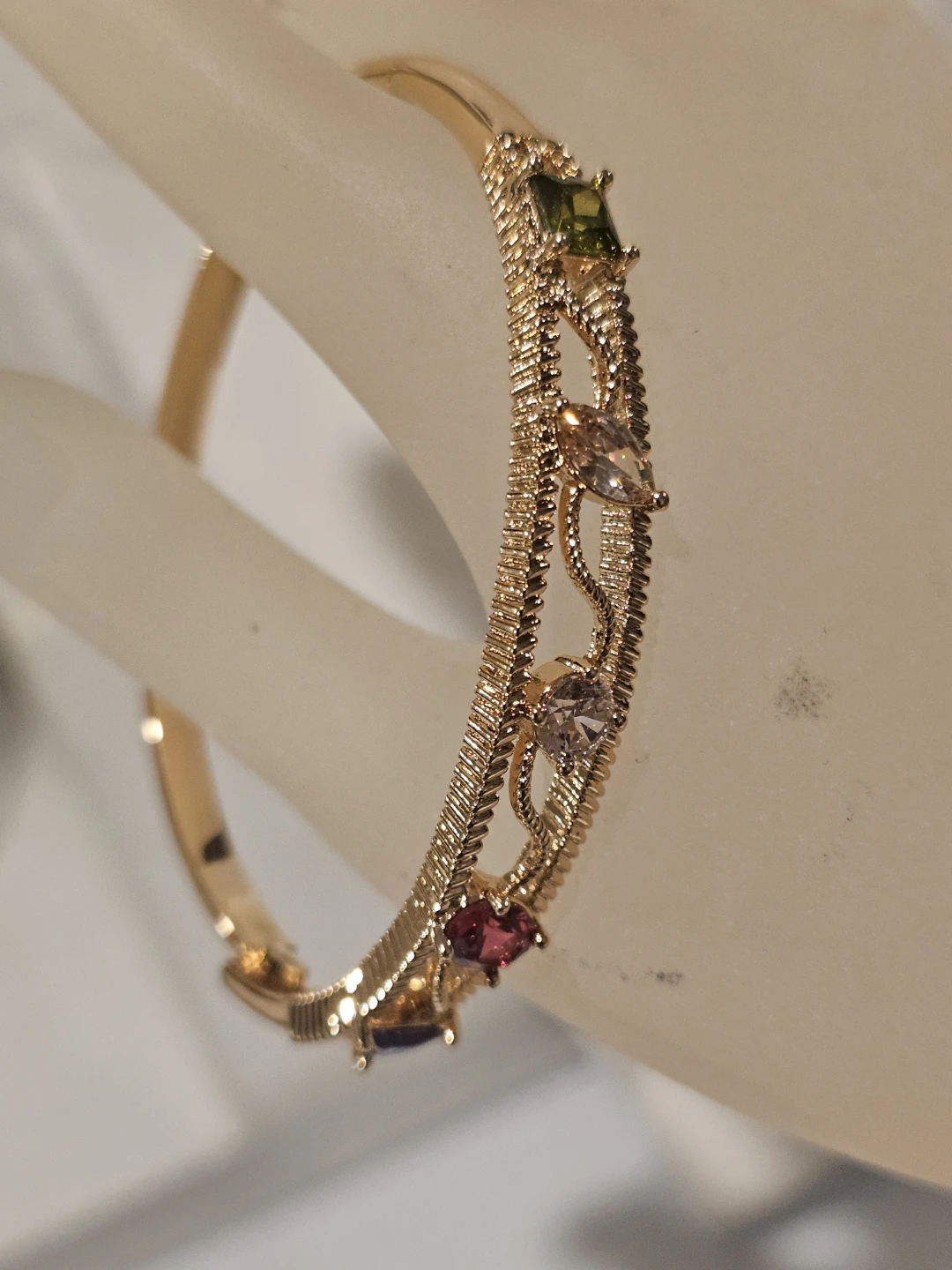 Gold tone bangle bracelet with colourful stones - photo 3