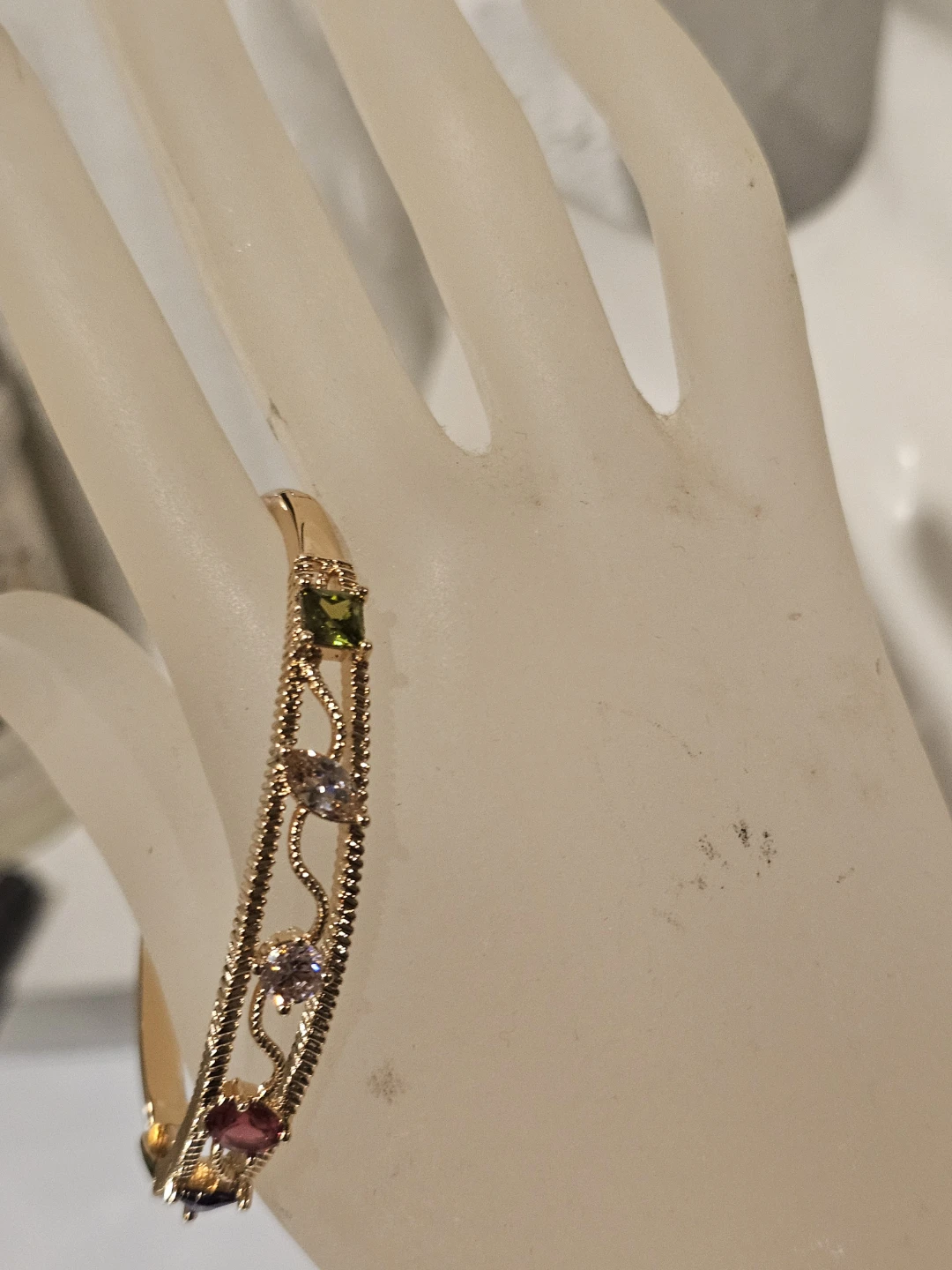 Gold tone bangle bracelet with colourful stones - photo 5