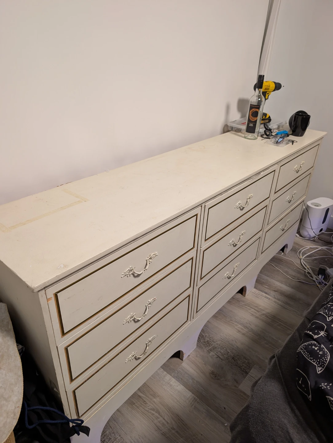 Dresser with 9 drawers and wooden framed mirror