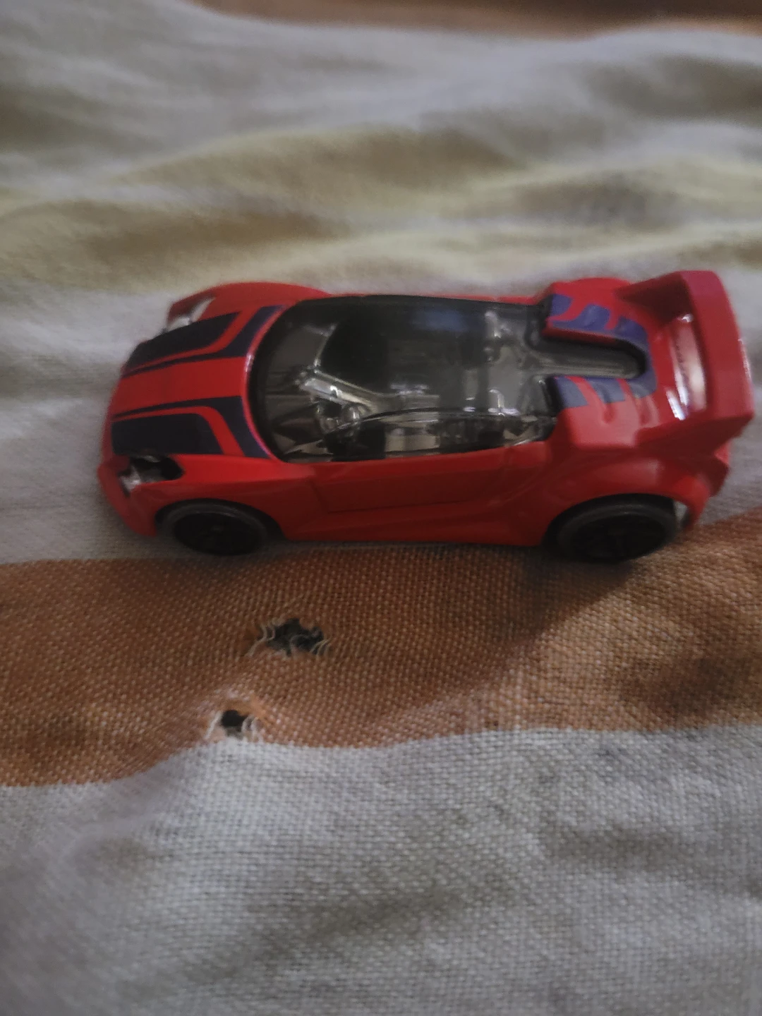 2012 Hot Wheels Quick N Sik 1:64 scale diecast car in red