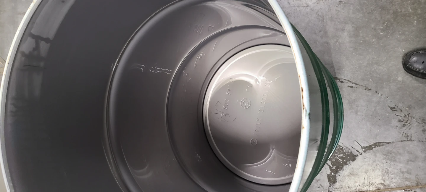 Green metal Barrel fpr garbage can