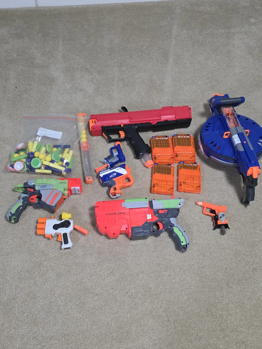 Assorted Nerf Blasters and Accessories
