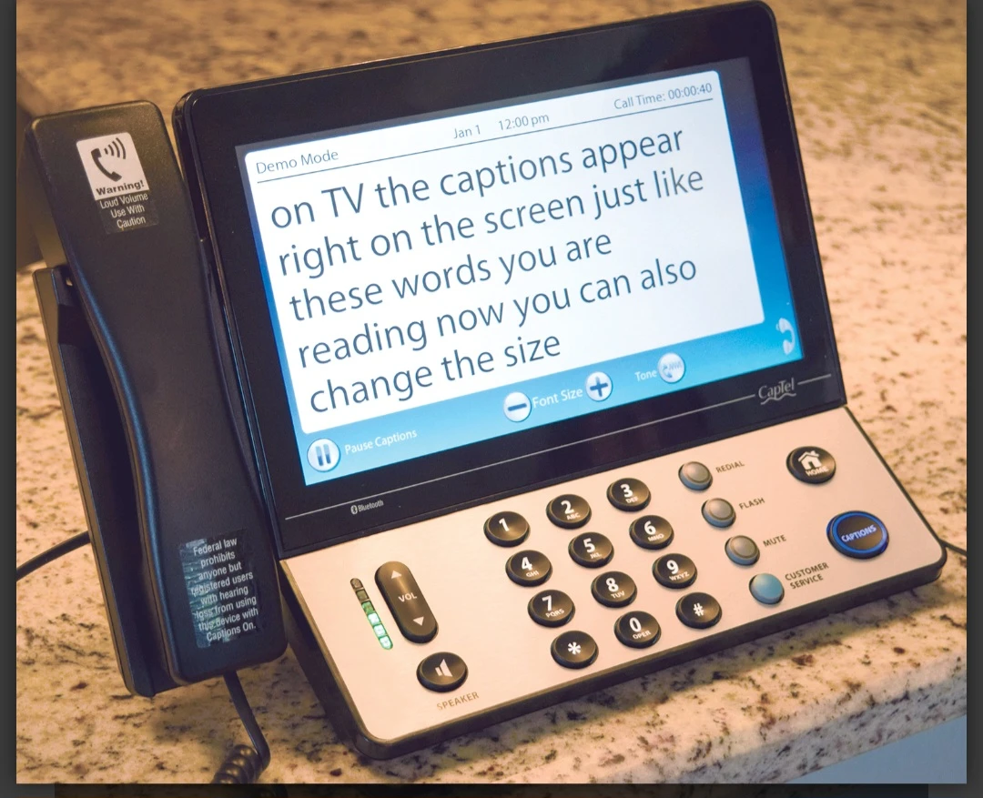 2 new in box caption phones