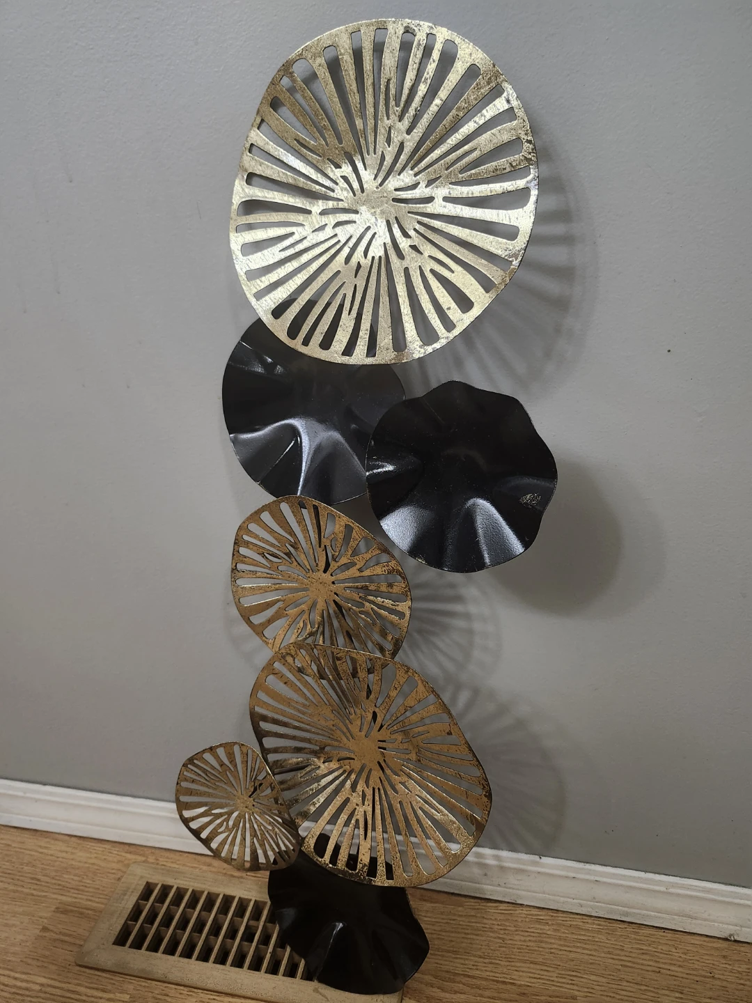 Gold and Black Metal Wall Art
