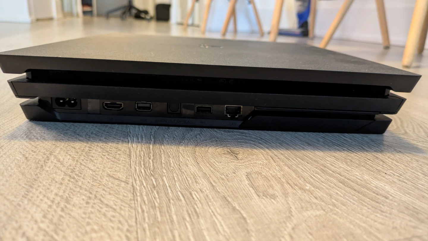 Sony PlayStation 4 Pro Console Bundle with Controller and Games - photo 2
