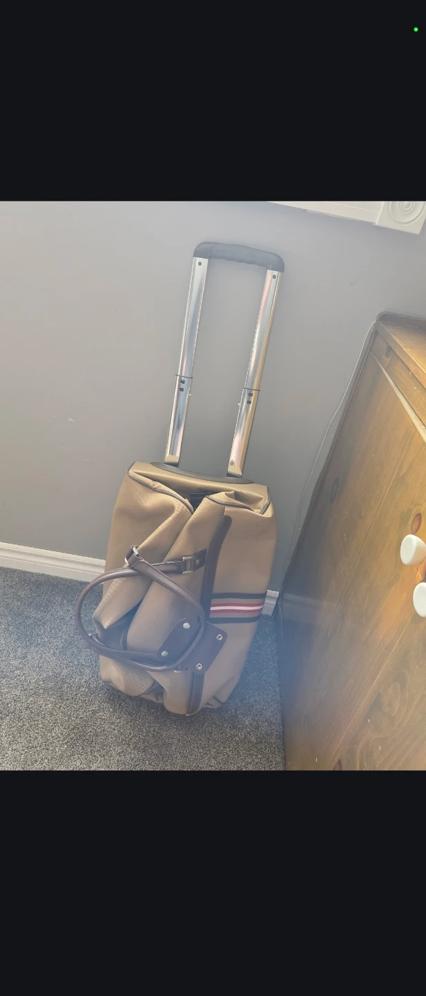 Studio D Rolling Duffle Bag