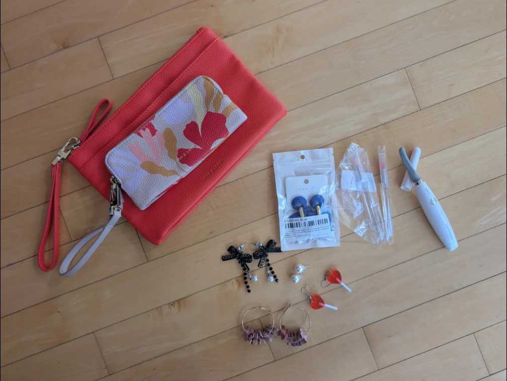 Clutches, earrings, lipstick applicators, heated eyelash curler