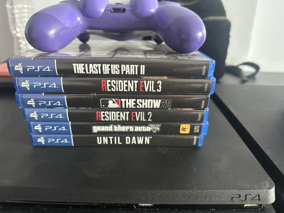 2 PlayStation 4 Consoles with Games and Controllers