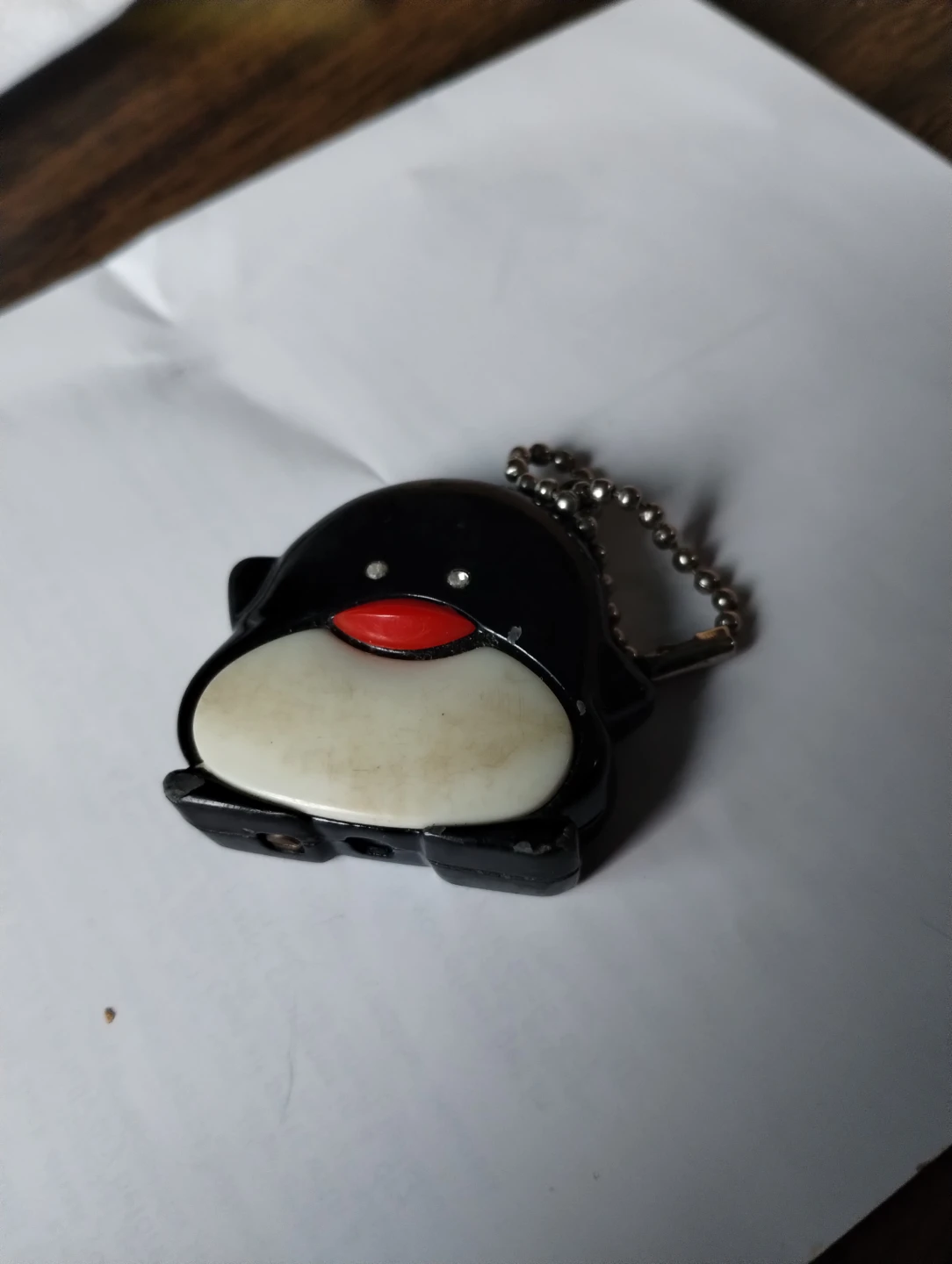 Black Penguin lighter with Red Beak