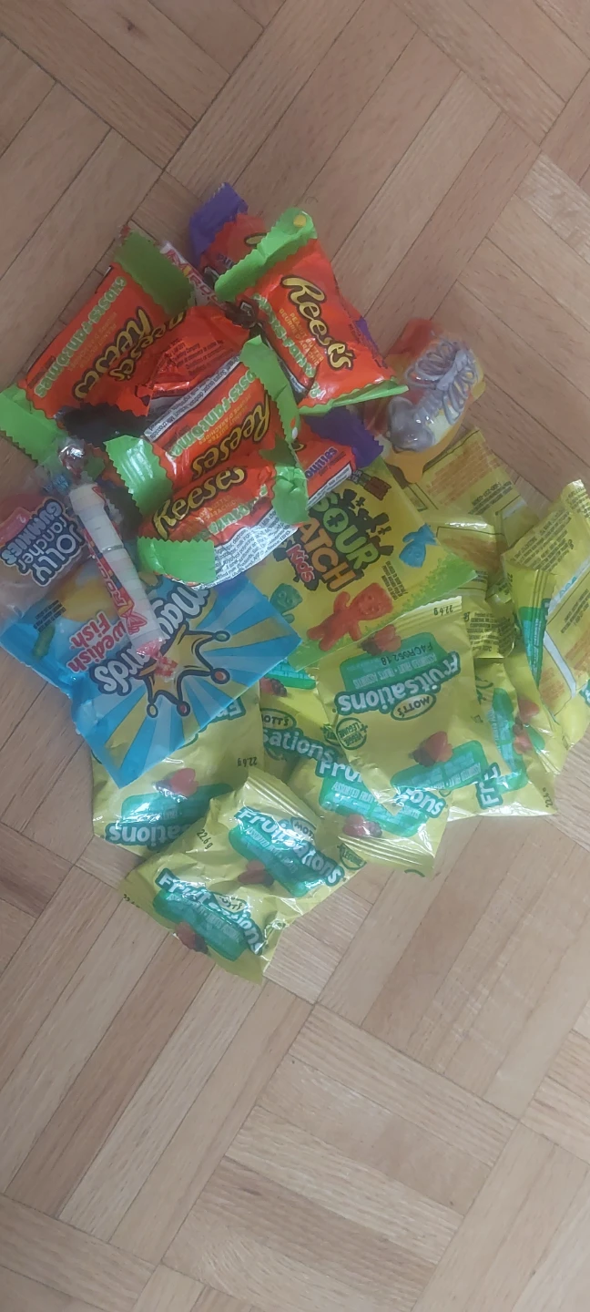 Assorted Candies: Reese's, Sour Patch Kids, Swedish Fish, Mott's