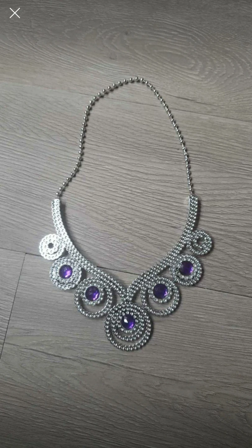 Silver tone necklace with purple gems