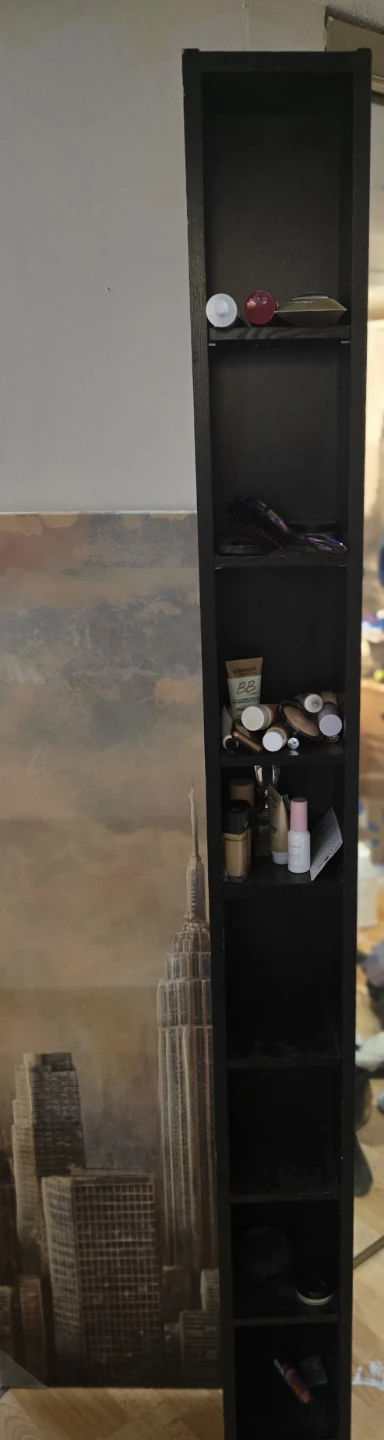 Tall Black narrow shelving unit