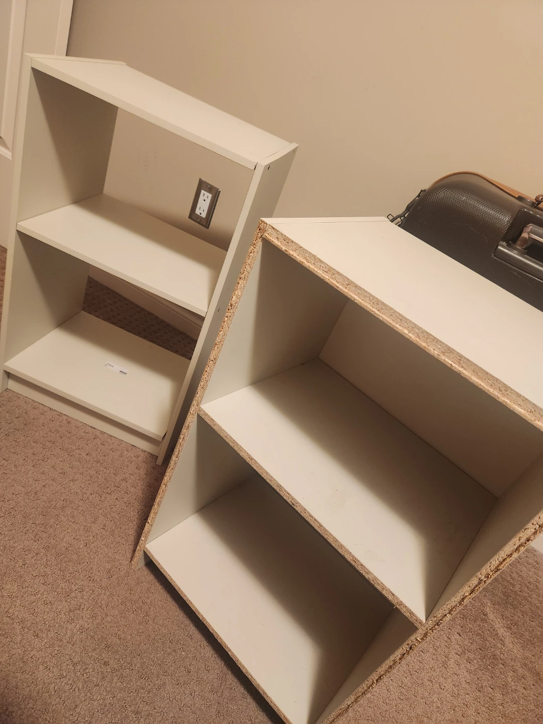 Two white bookshelves