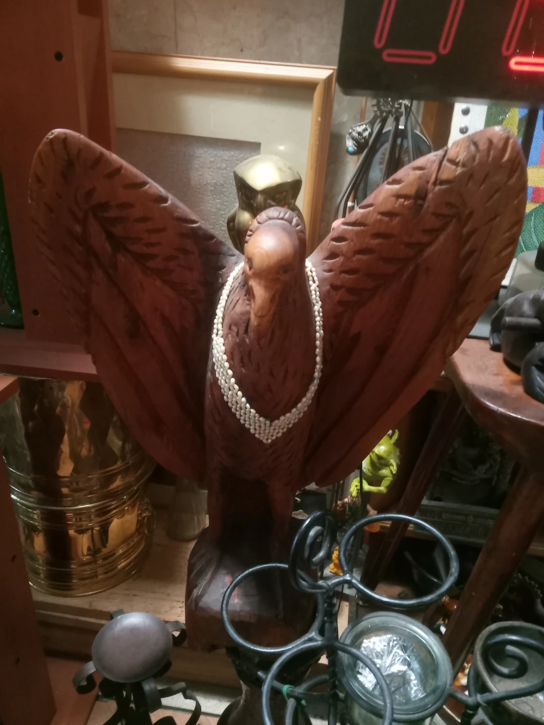 Hand-Carved Wooden Eagle Figurine with Pearl Necklace